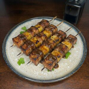 Alternative view of Maggies (Pork belly & pineapple skewers)